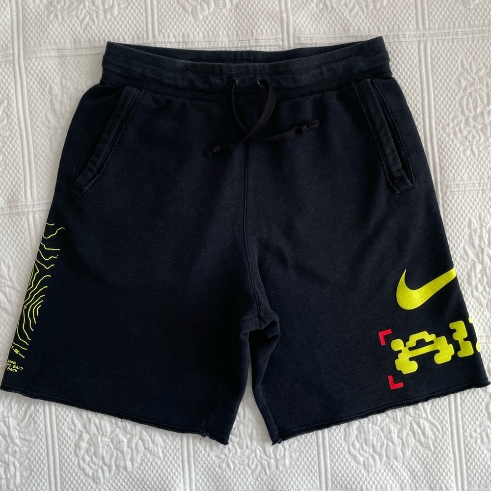 Nike Black Shorts with Neon Yellow Swoosh and Accents